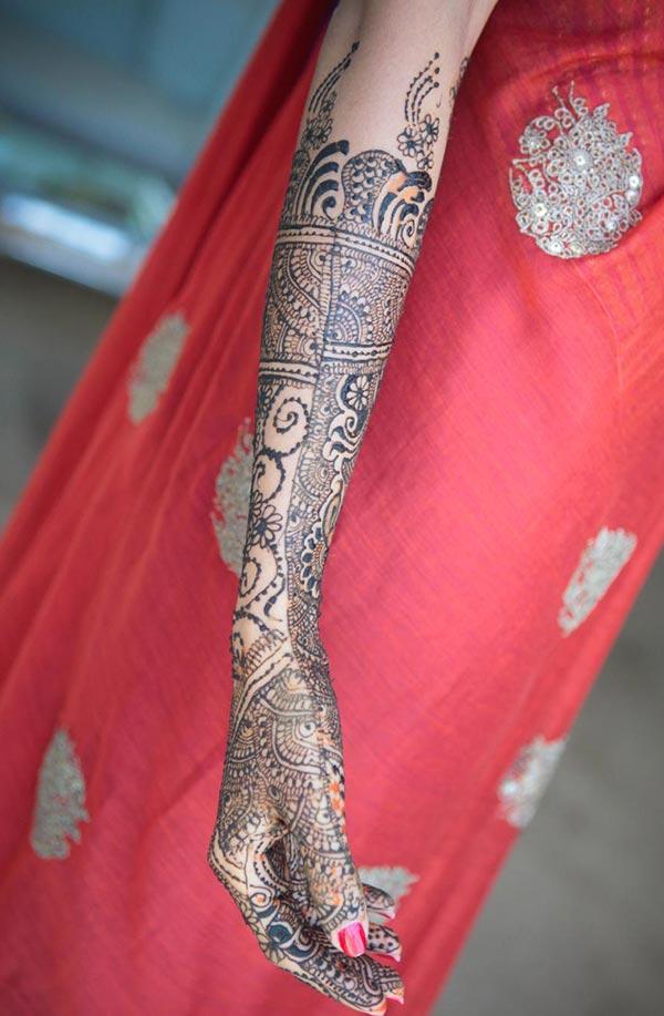 Full arm Mehndi tattoo designs idea