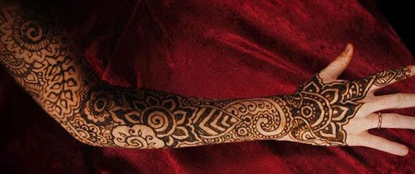 Full arm Mehndi tattoo designs idea