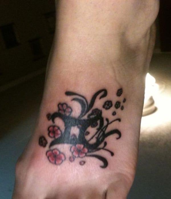 Gemini tattoo design idea is really pretty with black color for Girls.