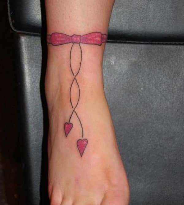 Ladies like a bow tattoo on their ankle to flaunt it