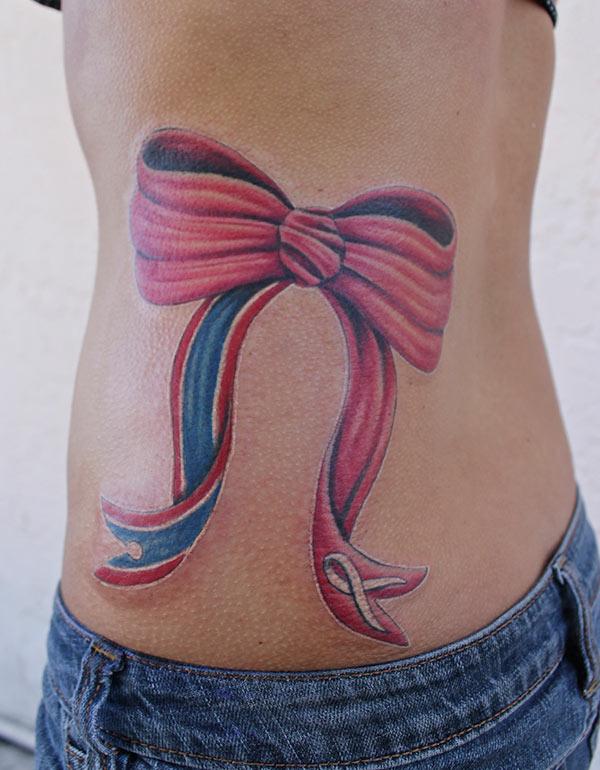 The orange and blue tattoo designon their side belly, will make the girls alluring and match with the blue pair of trouser