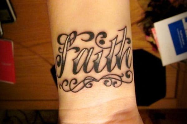 This nice black faith tattoo design is charming and attractive