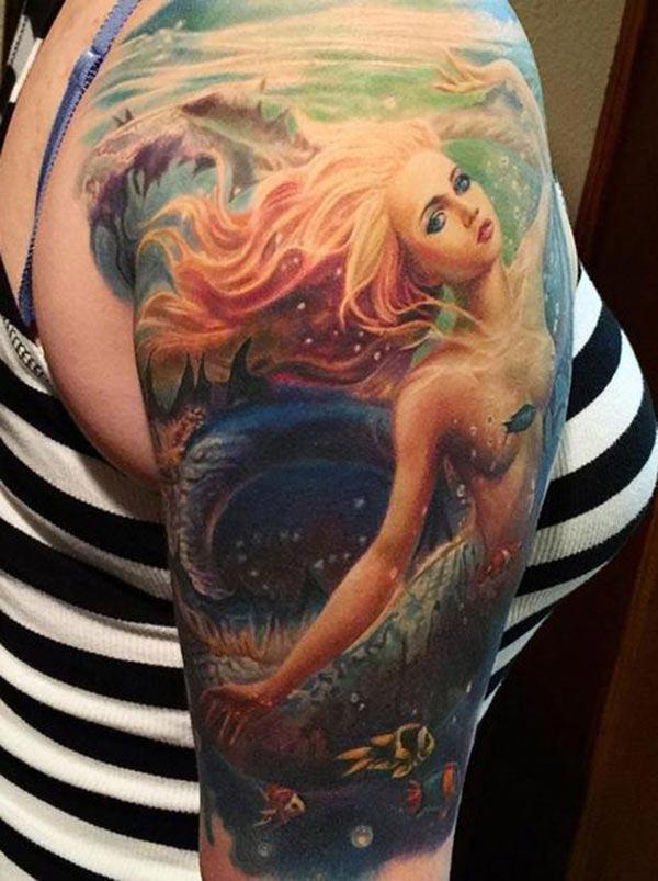 The beautiful mermaid tattoo for girls giving her a glamorous look