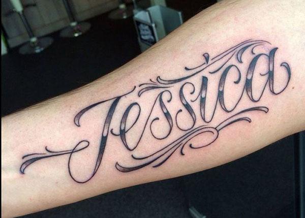 Name Tattoo on the lower arm brings the glamorous look