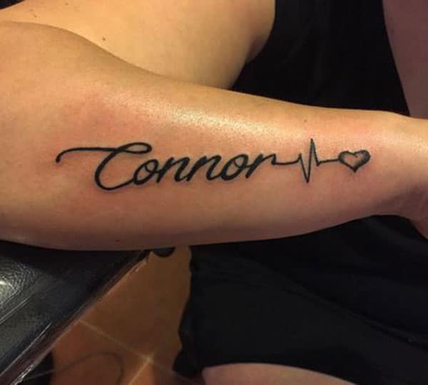 Name Tattoo on the lower arm brings the stunning look