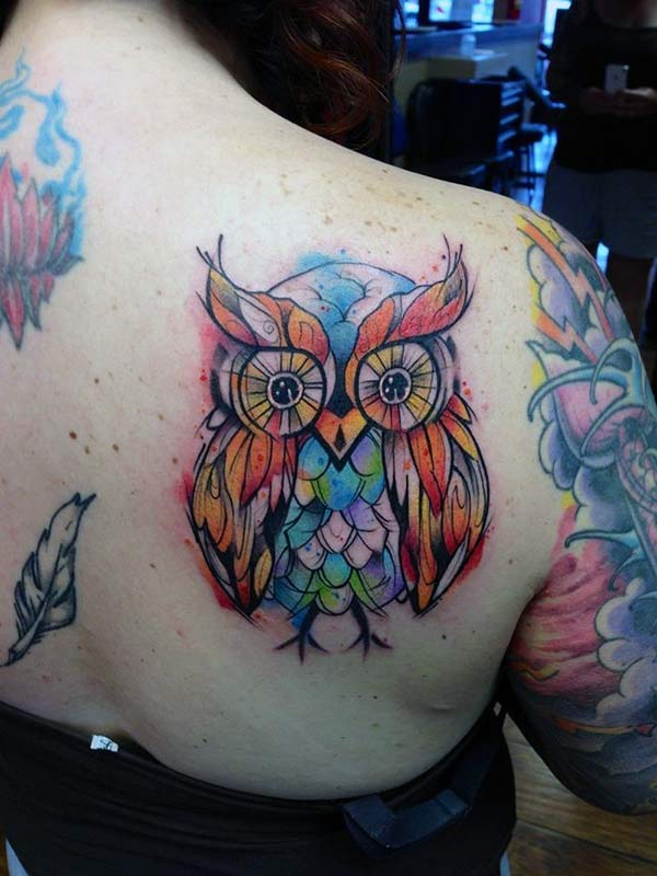 Owl Tattoo on the back makes a girl look so cute