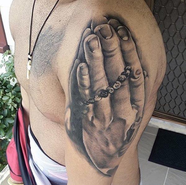 Praying Hand Tattoo on the shoulder makes a man look cool