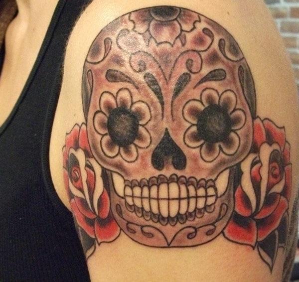 The perfect and reliable sugar skull tattoo for female arm
