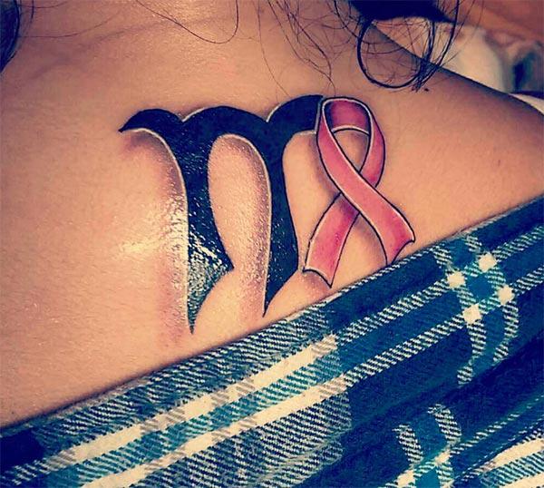Virgo tattoo with black and pink ink design brings a gorgeous look