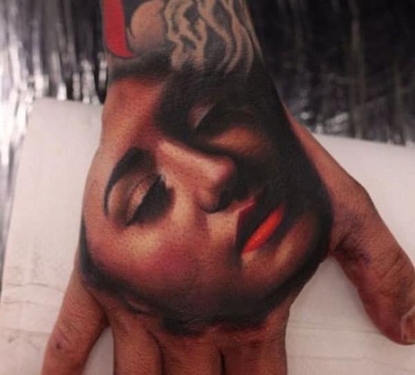 Amazing Tattoo on the hand makes a man look stylish