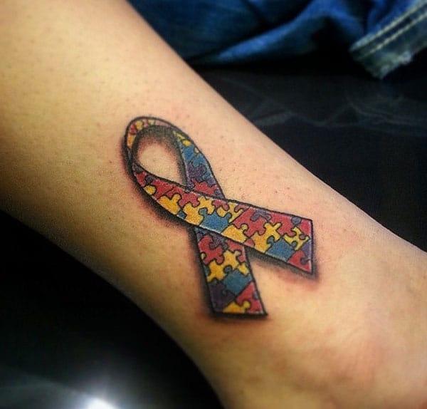 Autism Tattoo at the upper ankle make ladies look more glamorous