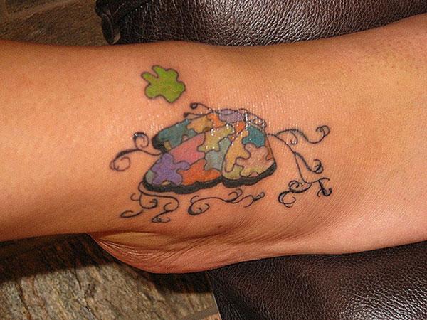 Girls make Autism Tattoo on their ankle to flaunt their legs