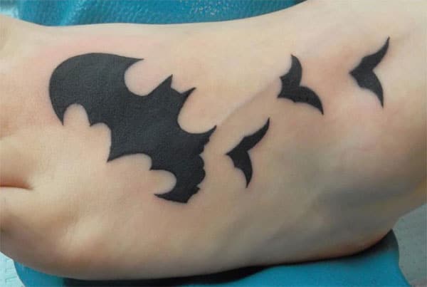 Makes a divine Bat tattoo on foot to flaunt it