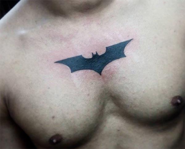 Bat tattoo on the upper chest makes a man look august