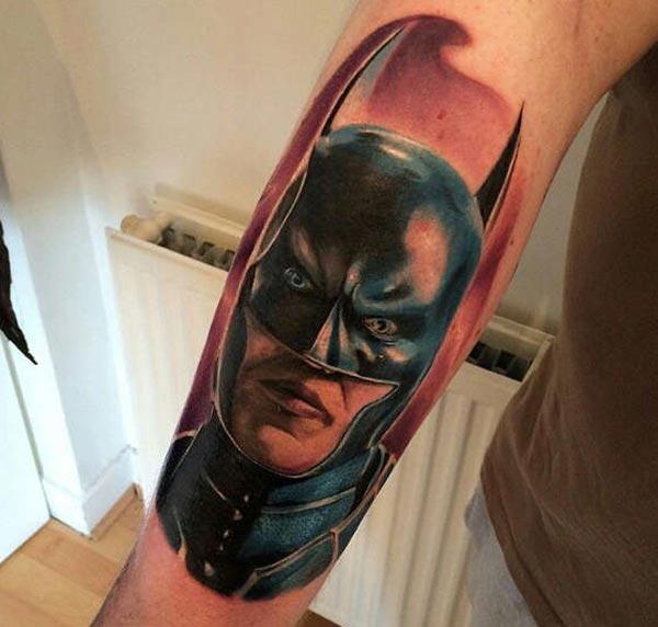 Batman tattoo on the lower back arm makes a man have a dapper look 