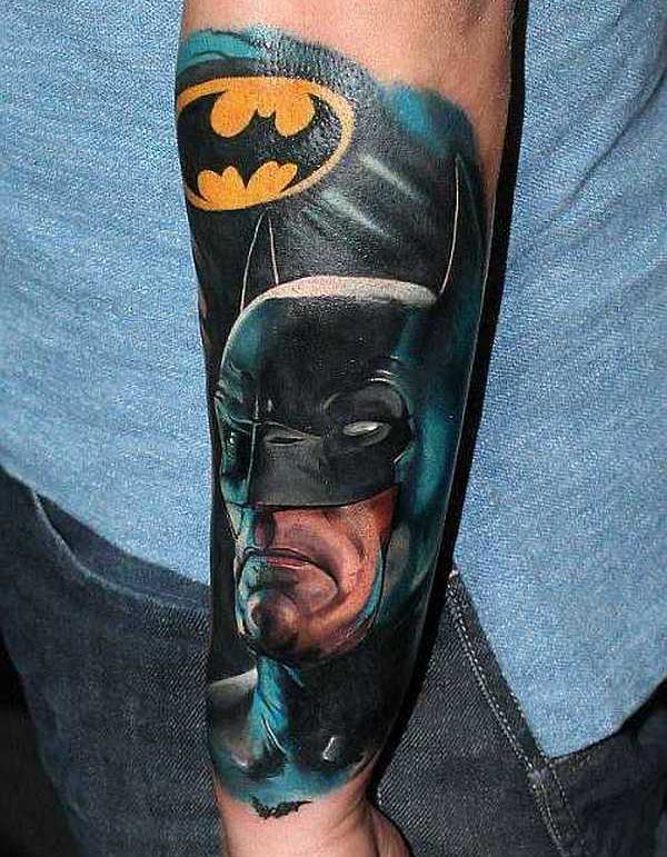Batman tattoo on the lower back arm of the hand make a man look cool