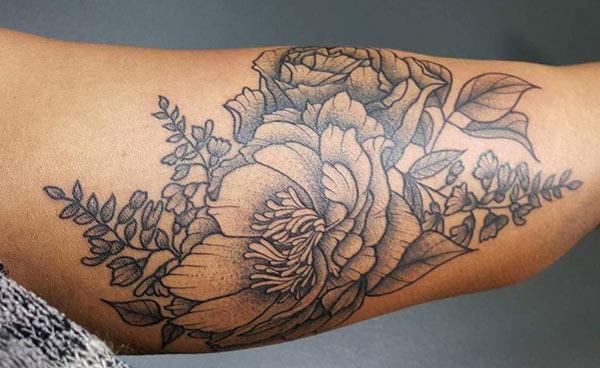BicepTattoo for men with a flower design make them look stunning