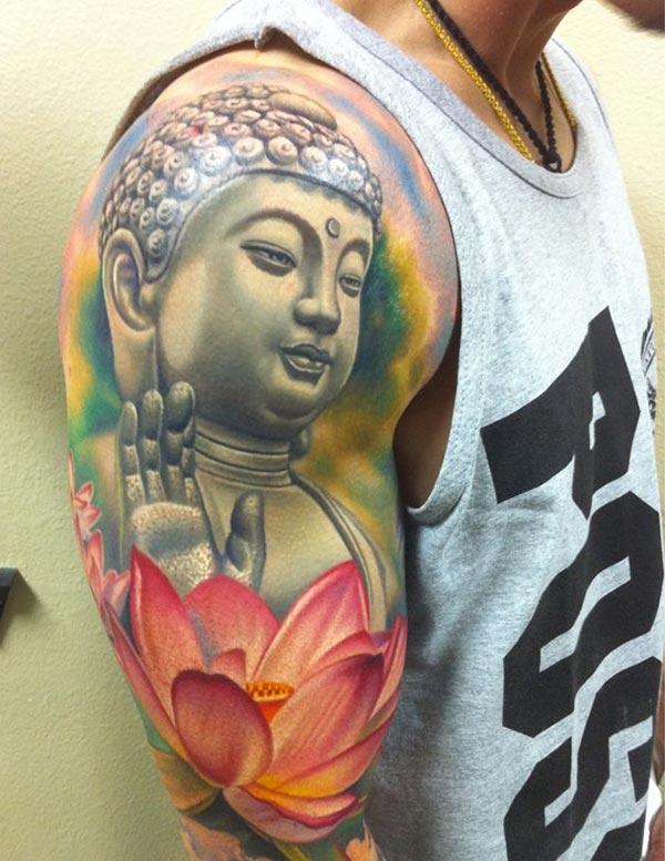 Buddha Tattoo for men with a flower ink design make a men look graceful