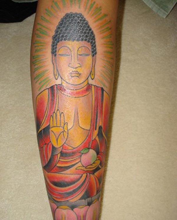 Buddha tattoo on the lowerarm makes a man look gallant 