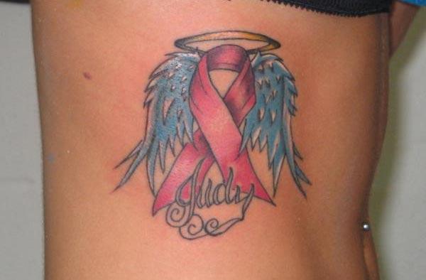 Cancer Ribbon tattoo on the side belly gives the deplorable look