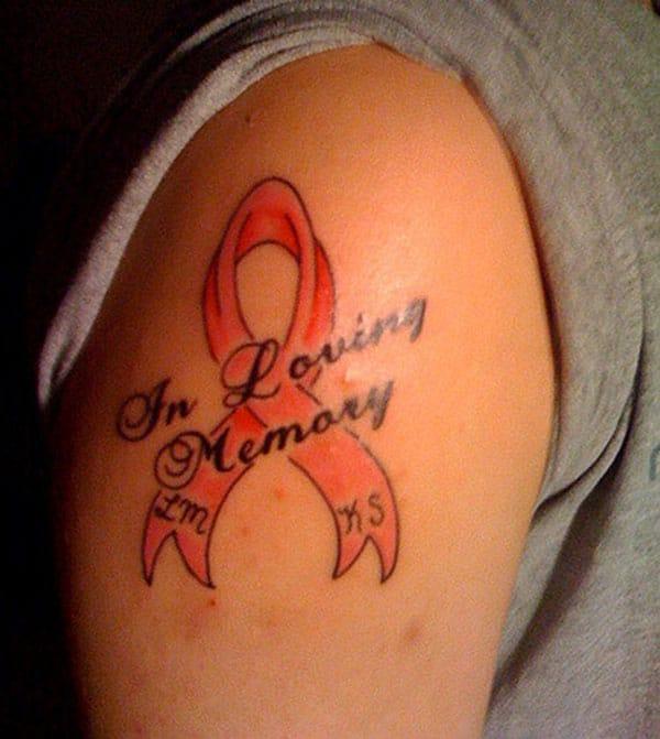 Cancer Ribbon tattoo on the shoulder shows the nasty look