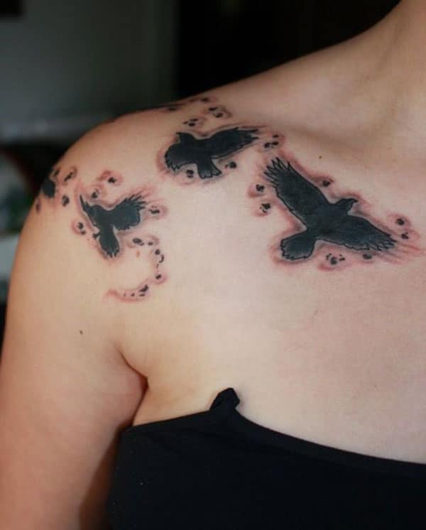 Collar Bone Tattoo with black birds ink design brings a gorgeous look