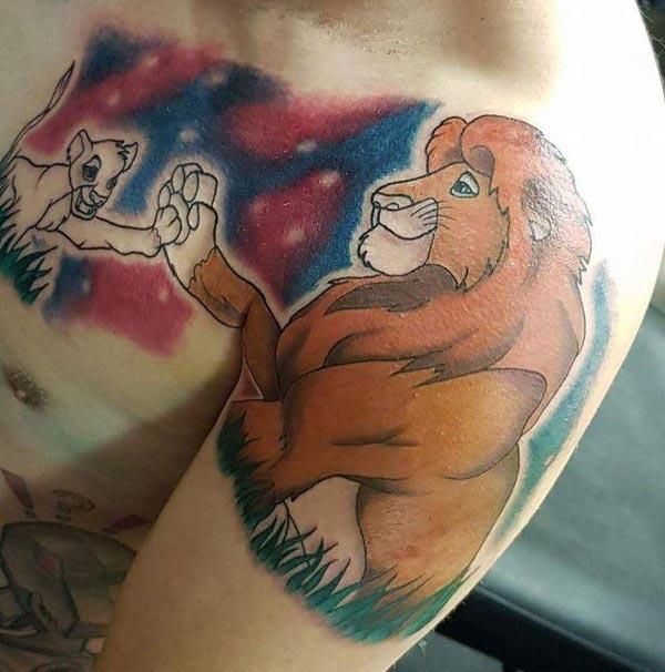 The bright ink design of the Disney Tattoo on the upper arm and upper chest make a man look majestic 