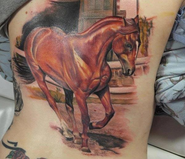 The Horse tattoo on the back with brown ink design make a man look admirable 