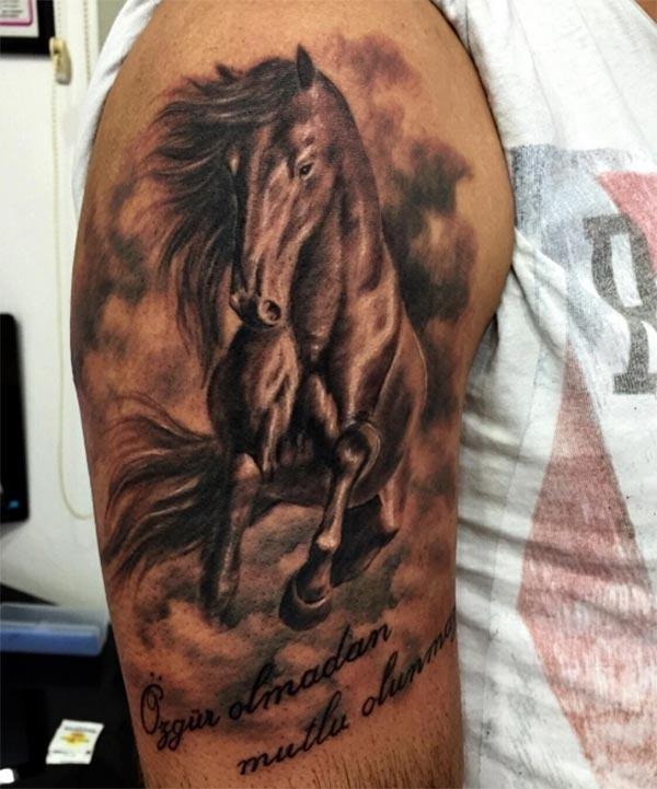 Horse tattoo of the shoulder make a man look foxy