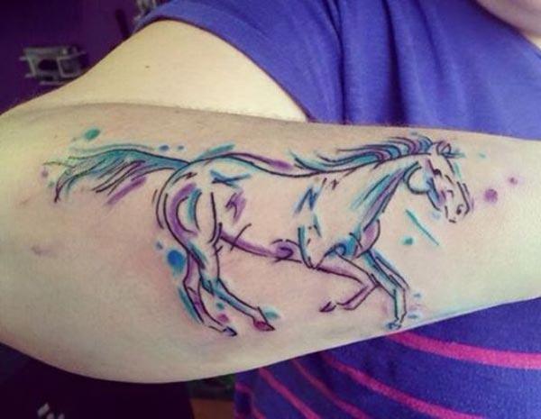 Horse tattoo with blue ink design make a man look stylish