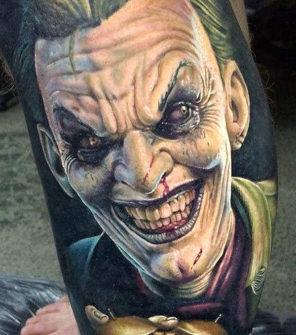 Joker Tattoo on the foot brings the majestic gaze