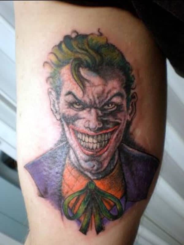 Joker Tattoo for men with purple ink design makes a man look classy