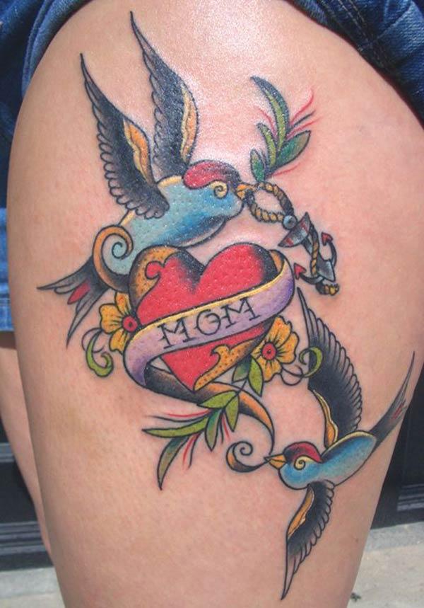 Mom tattoo on the side thigh gives the girls an attractive look