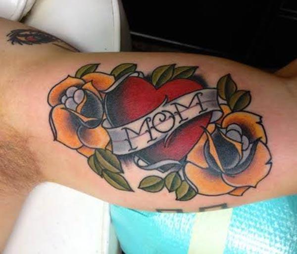 Mom Tattoo for men with the flower design on the bicep make them look magnificent