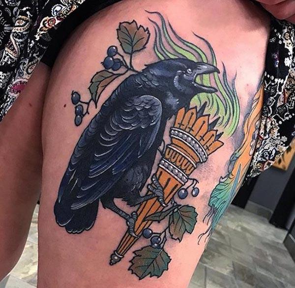 The Raven tattoo on the left side thigh, brings the loyalty look in girls