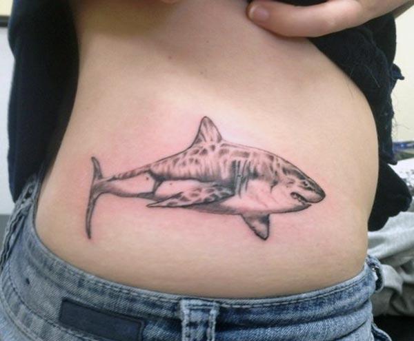 Shark Tattoo on the side makes a girl look captivating
