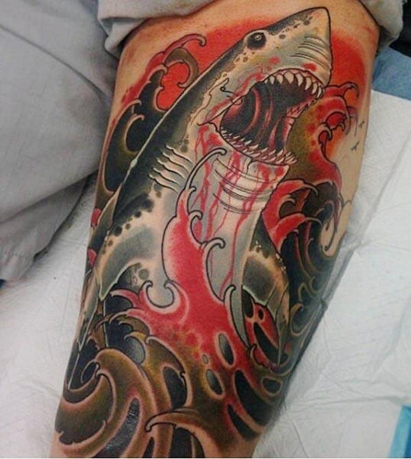 Shark Tattoo for men with dark ink design makes a man look cute