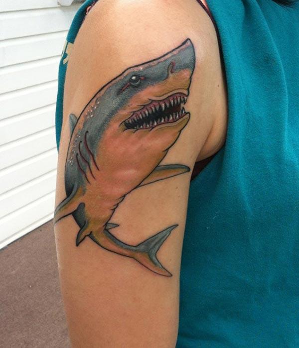 Shark Tattoo on the shoulder makes a women look attractive 