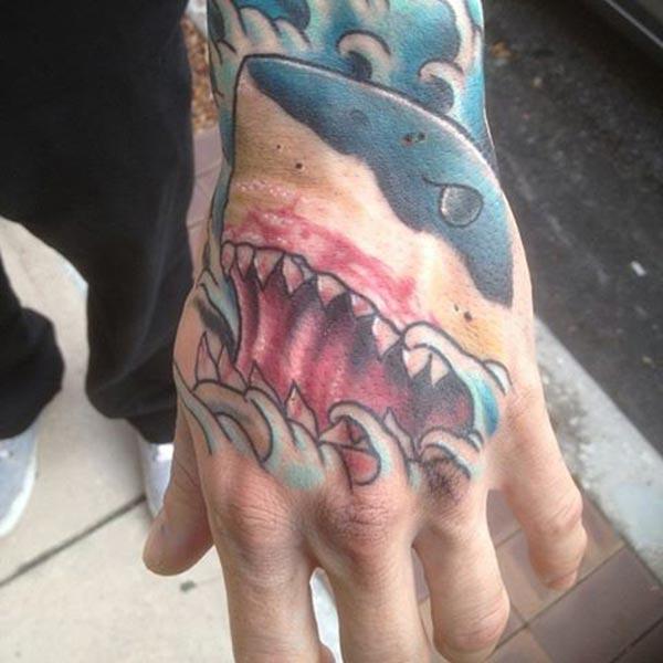 Shark Tattoo on the hand makes a man look cool