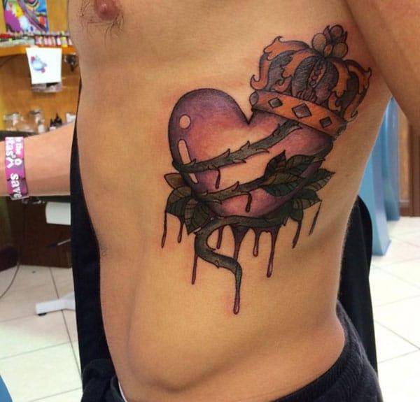 Side tattoo with a love flower make a man look cool