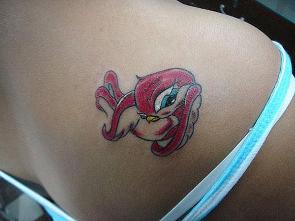 Sparrow tattoo on the back shoulder makes a women look attractive