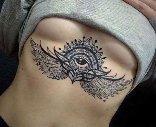 Sternum tattoo for Women with a black ink design makes them look captivating