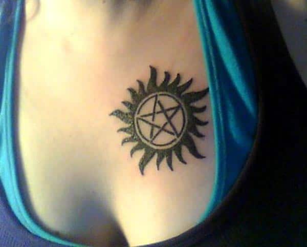 Supernatural tattoo on the upper chest brings a feminist look