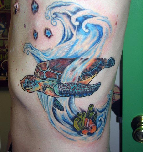 Turtle tattoo with a brown and blue ink design makes a man look cute