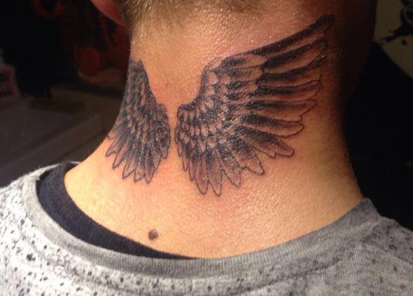 Wing tattoo on the back neck make a man look cute