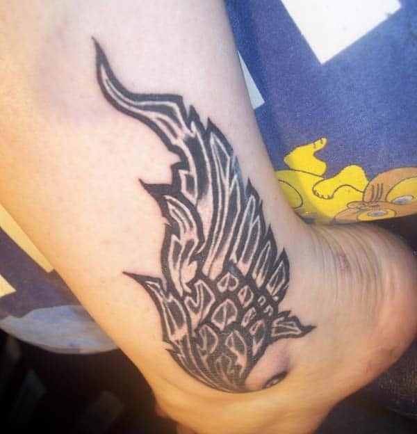 Wing Tattoo on the foot brings the artful look