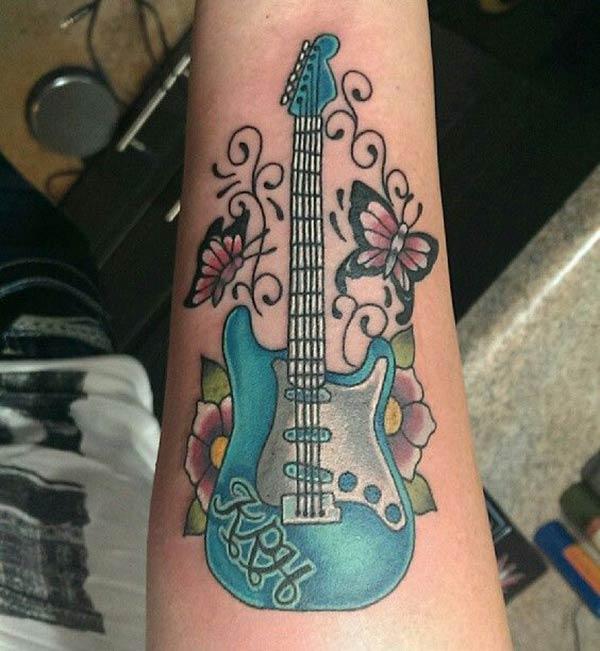 Guitar Tattoo on the lower arm make a man look cool