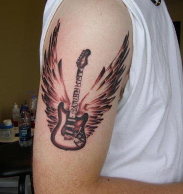 Guitar Tattoo on the right arm, make men look more attractive