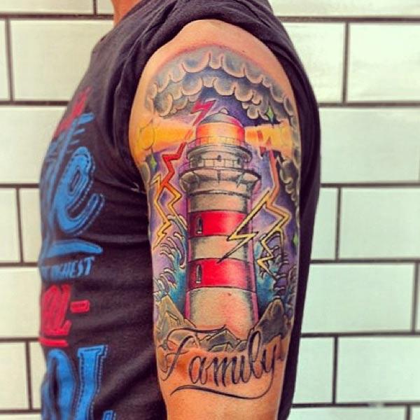 The Lighthouse Tattoo on the upper left arm makes a man look admirable
