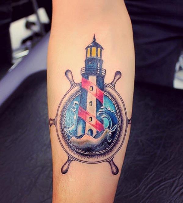 Lighthouse Tattoo on the arm makes a man look gallant 